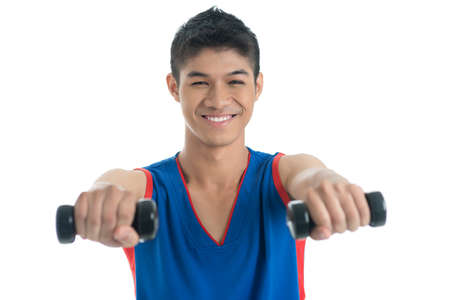 Isolated portrait of a happy guy living a healthy lifestyleの写真素材