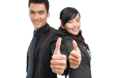 Isolated shot of an enthusiastic business team being satisfied with the results of the workの写真素材