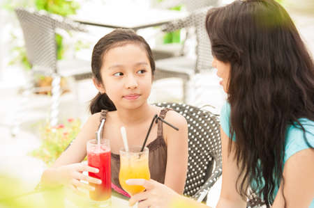 Family relaxation with juices outdoorsの写真素材