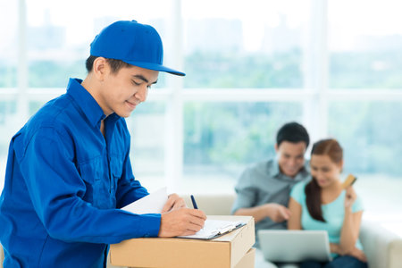 Conceptual image of a couple making an online order and a delivery guy providing the service