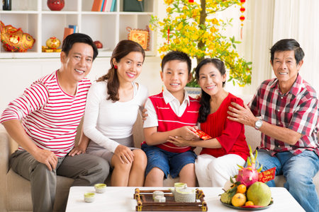 Portrait of a big Asian family celebrating the Chinese New Year together at home の写真素材