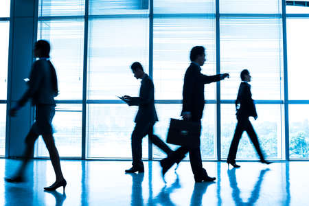 Image of hurry businesspeople during the rush hour の写真素材