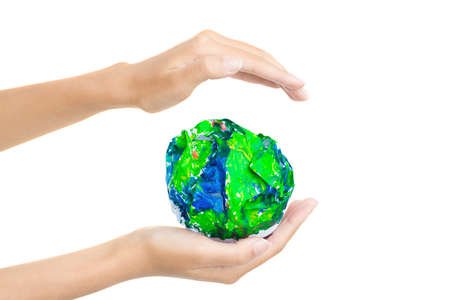 Paper-planet in handの写真素材