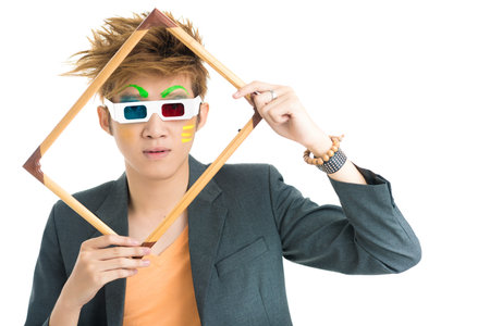Asian boy holding frame
