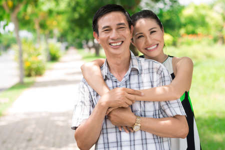 Close-up of a smiling couple in the parkの写真素材