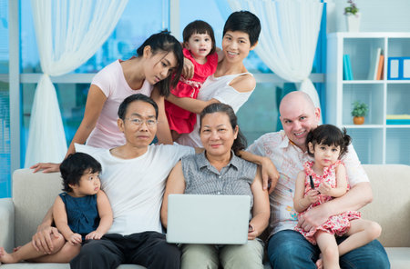 Portrait of a big international family at home