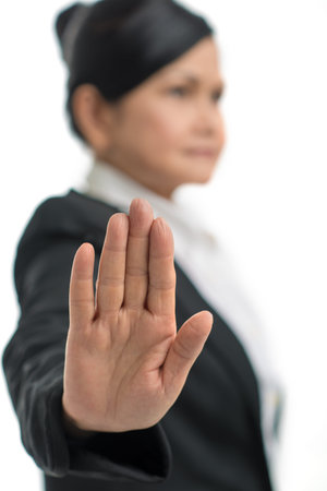 Vertical image of a businesswoman or politician giving no comments