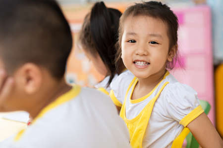 Young asian girl in the kindergartenの写真素材