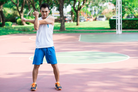 Portrait of a young athlete training outside