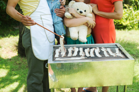 Close-up image of barbecue preparation outsideの写真素材
