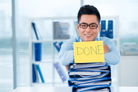 Copy-spaced portrait of a happy businessman having done all job for today on the foreground 