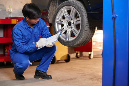 Examining carの写真素材