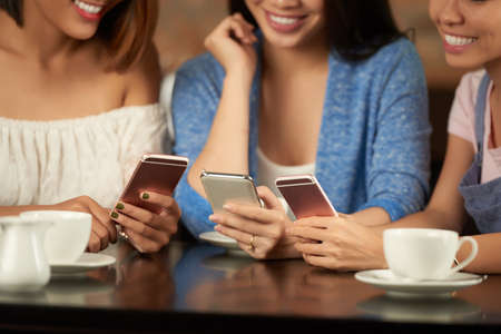 Texting girlsの写真素材