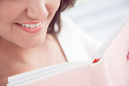 Close-up of female smileの写真素材