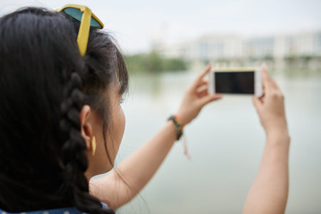 Girl taking a picture