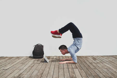 Performing handstandの写真素材