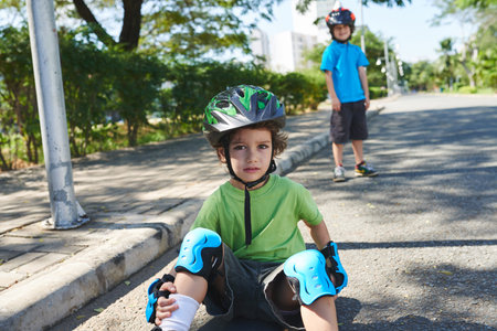 Portrait of handsome little skateboarder
