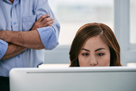 Close-up of Asian woman in officeの写真素材