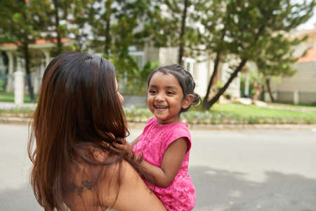 Having fun with momの写真素材