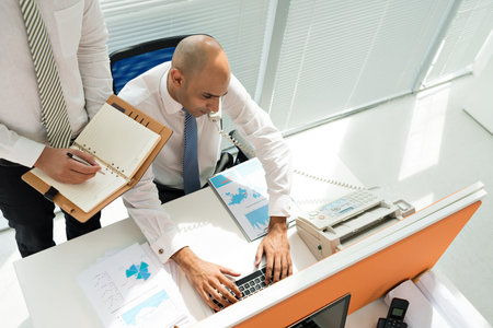 Businesspeople at work, view from above