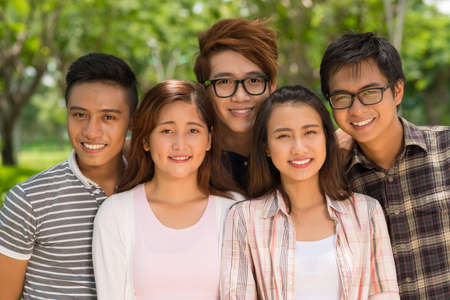 Portrait of smiling Vietnamese college students looking at the cameraの写真素材