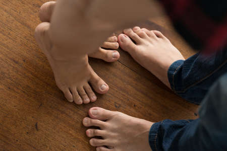 Feet of kissing coupleの写真素材