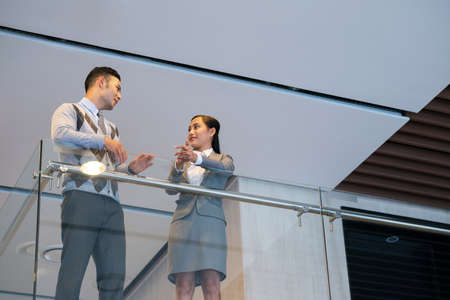 Two business colleagues having discussion during the breakの写真素材