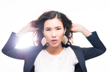 Attractive Vietnamese brunette looking at the cameraの写真素材