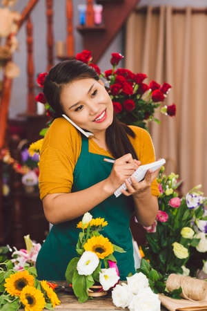 Sunflowers and roll of stringの写真素材