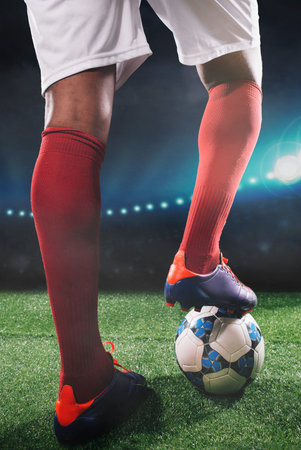 Soccer player is ready to kick off the game