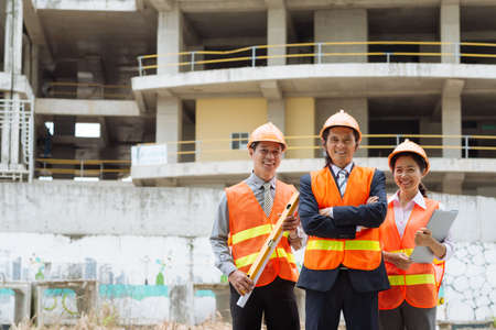 Vietnamese engineers at construction siteの写真素材