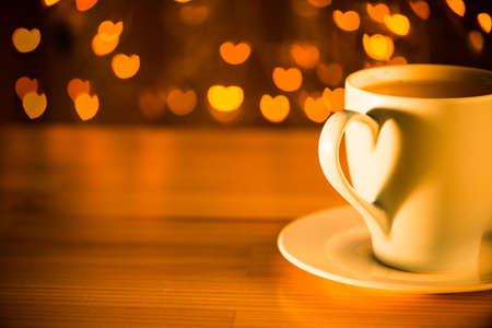 Cup of hot chocolate on the wooden tableの写真素材