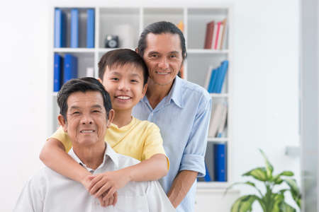 Portrait of male generations in the familyの写真素材