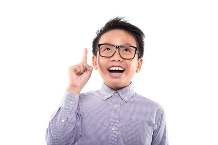 Portrait of happy Asian boy having an idea