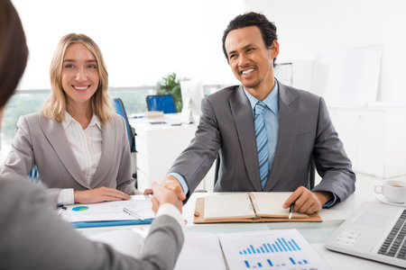 Multi-ethnic business partners having meeting in the office