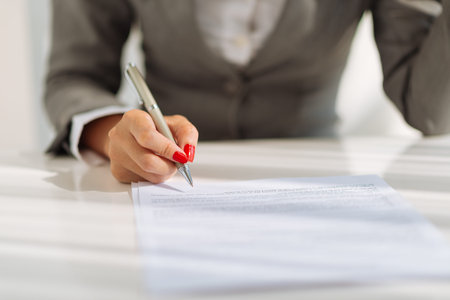 Female lawyer checking document for her client