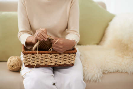 Cropped image of woman crocheting a hatの写真素材