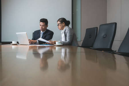 Serious business people working together in the officeの写真素材