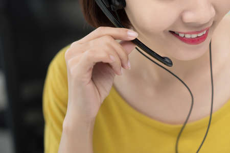Cropped image of friendly call center operatorの写真素材
