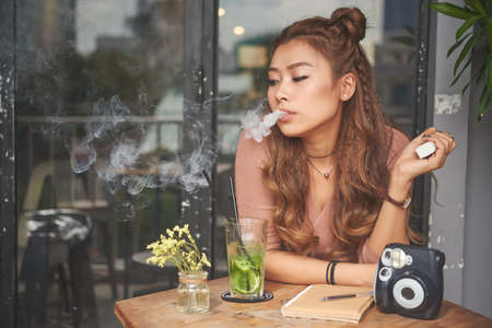 Smoking girlの写真素材