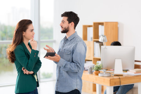 Young pretty Asian woman receiving financial advice