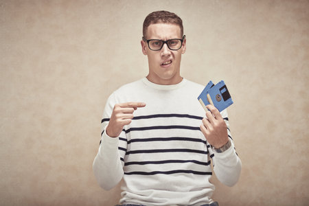 Man with floppy diskの写真素材