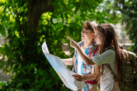 Tourists using map to find the right directionの写真素材
