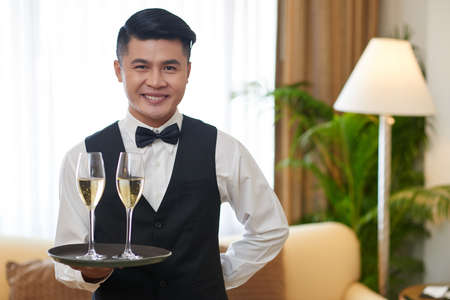 Serving champagneの写真素材