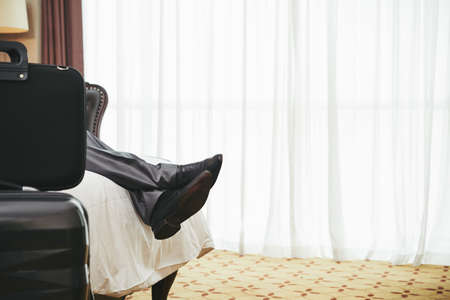 Resting in hotel roomの写真素材