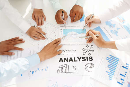 Team analyzing business activity of the companyの写真素材
