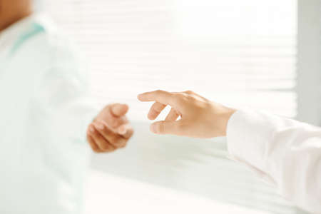 Man giving hand to a person who needs itの写真素材