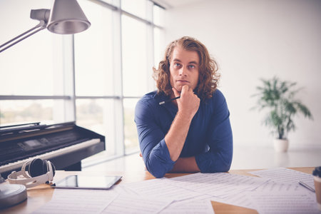 Professional composer thinking over new ideasの写真素材