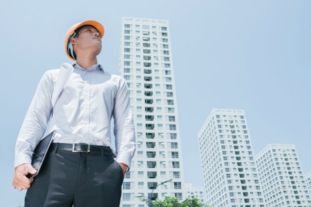 Young chief project engineer at construction site
