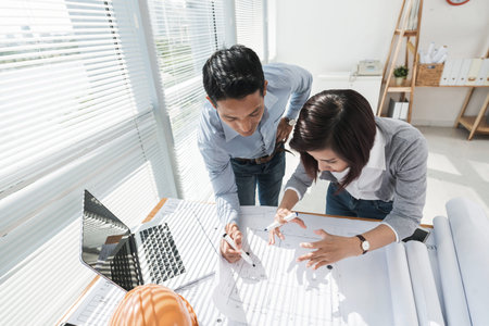 Vietnamese colleagues working in architect bureau